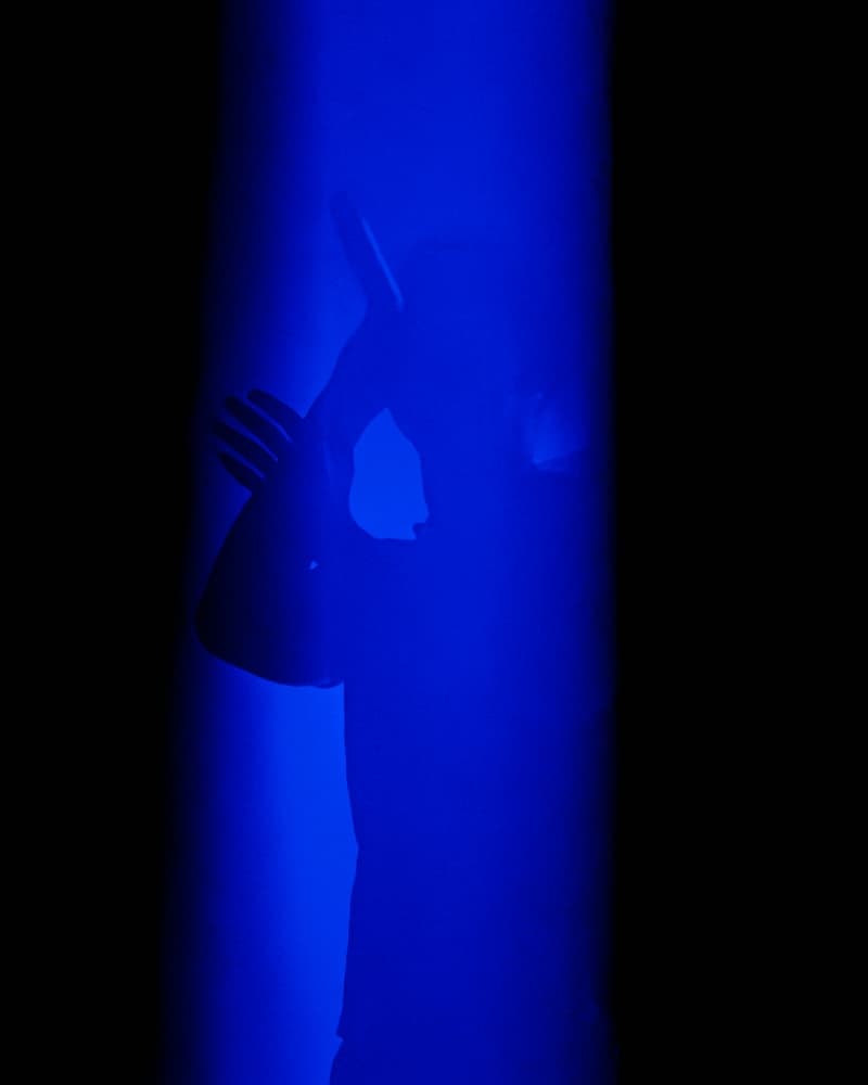 Ares singing in blue